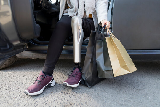 Woman's Legs and Shopping Bags