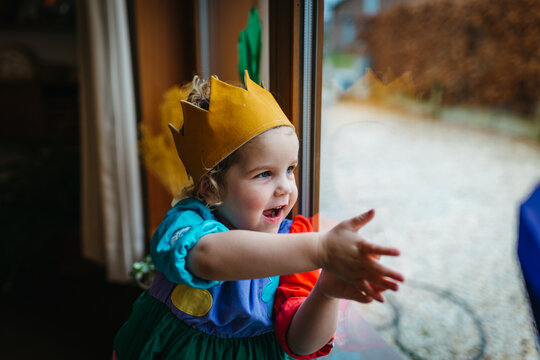Birthday girl by the window