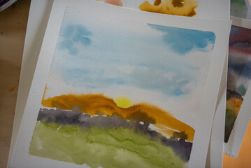 Various art supplies and painting