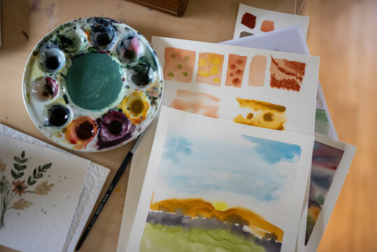 Various art supplies and painting