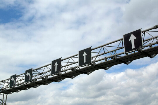 Direction sign on a highway.