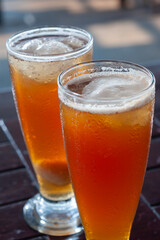 Two glasses of Iced Lychee Tea