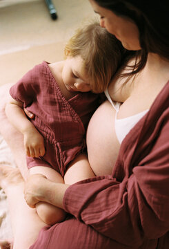 Pregnant mother with her toddler