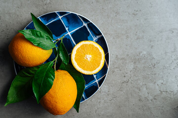 Fresh oranges arranged on a table