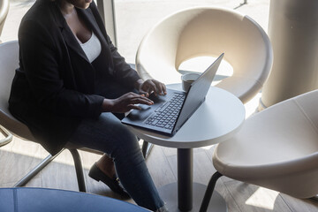 entrepreneur, black business woman in cafe working online on computer