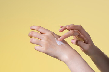 Beauty asian woman hands apply lotion and cream on her hand