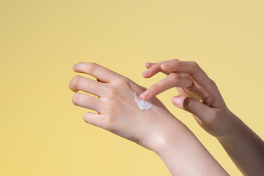 Beauty asian woman hands apply lotion and cream on her hand