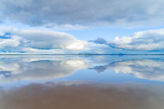 Reflection of land and sky