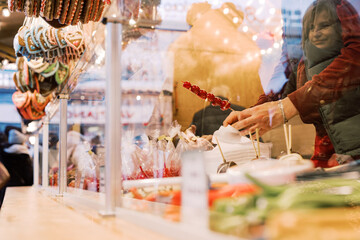Christmas Market Moments: Women Buying Sweets
