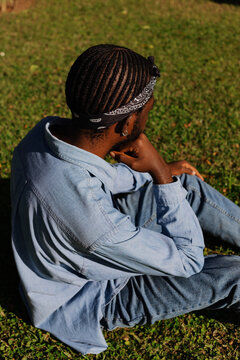Man with Cornrows