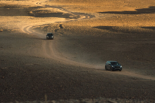 Cars driving in a martian landscape