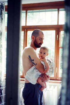 A father and child after bath