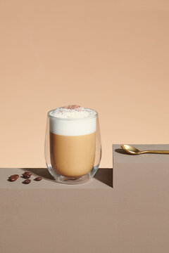  milk latte with thick foam in a glass