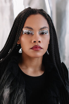 Black woman fashion makeup closeup in daylight