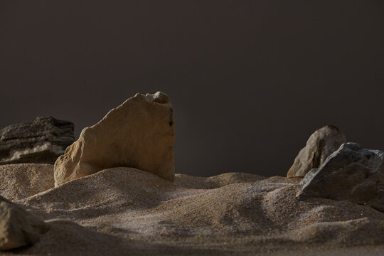  Front view of rock podium on the sand