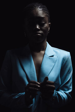 a bright girl on a dark background 