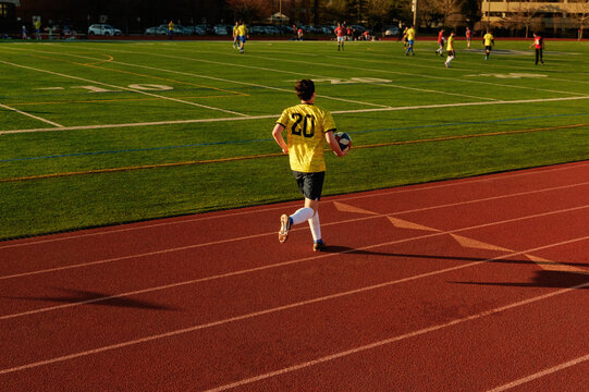 Football soccer player ran out for the ball during the game
