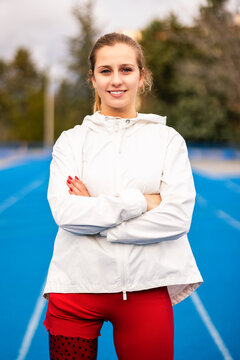 Portrait of young smiling paralympics athlete with a leg prosthesis