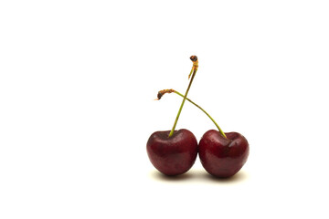 Two Red Cherries isolated on white background