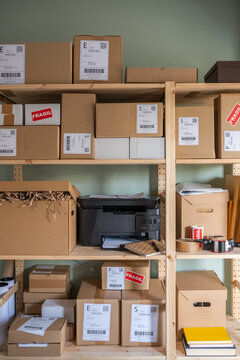 Parcels on shelves in logistic office