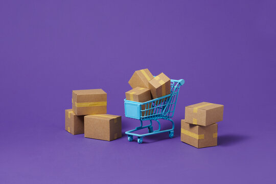 Trolley with cartons. With copy space