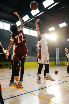 Basketball team competing in game