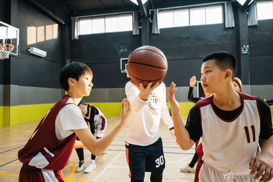 Basketball team competing in game
