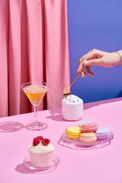 Eating a panna cotta with a spoon.