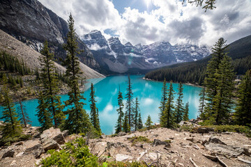 Beautiful and colorful Lake Moraine seen through the trees.