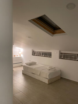 Interior of spacious apartment with bed