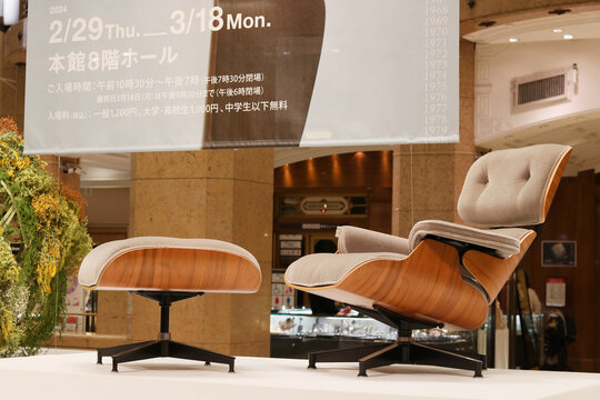 TOKYO, JAPAN - March 3, 2024: An Eames chair and ottoman on display in Nihonbashi Takashimaya department store where an exhibition of chairs is being held.