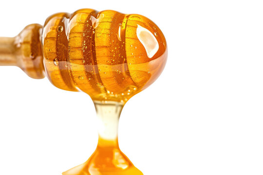 Honey dripping from honey dipper isolated on transparent background.