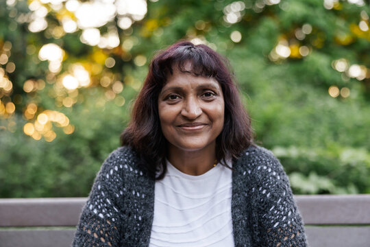 Cheerful Adult Portrait: Woman with Happy Emotion and Smiling Fa