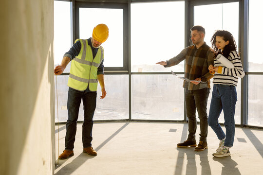 Builder Take Wall Measurements Building Space