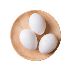 Organic white leghorn egg from free range farm on wooden plate, top view - obrazy, fototapety, plakaty