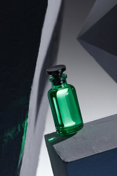 Green Cosmetic Product for Skin Care on Glass Background