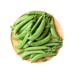Fresh green pea in wooden plate, top view