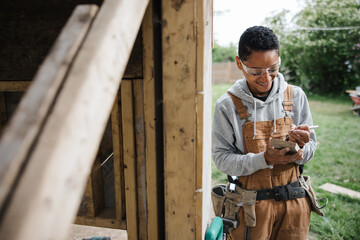 Skilled Carpenter at Work: Using tool for Her Occupation.
