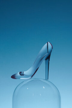 Crystal high heels stand balancing on spheres