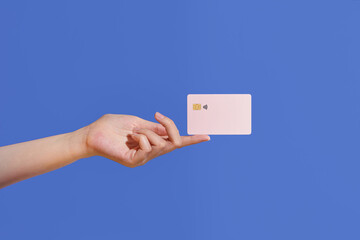 Side closeup of woman's finger facing up and levitating plastic
