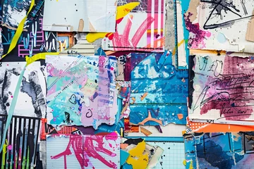 Fotobehang A creative chaos of torn notebook papers, embodying the punk aesthetic with a modern twist © Saran