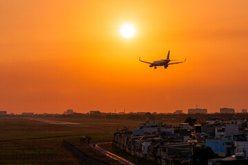 The plane landed at sunset