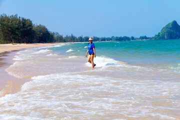 Woman walk relax at beach Bang Boet
