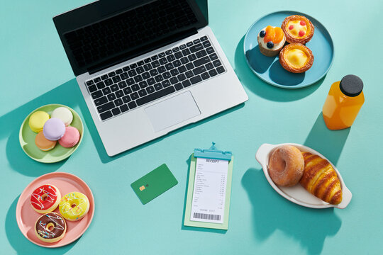 top view laptop dessert table