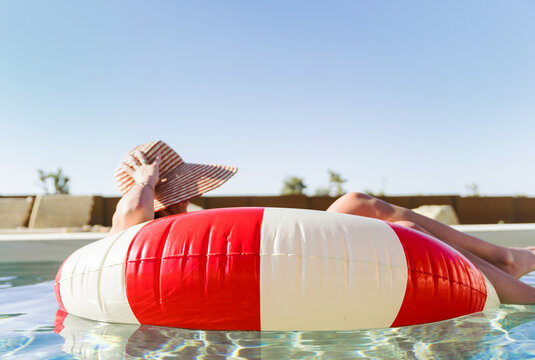 giant red and white pool floaty