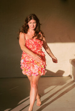 woman wears flower party dress 
