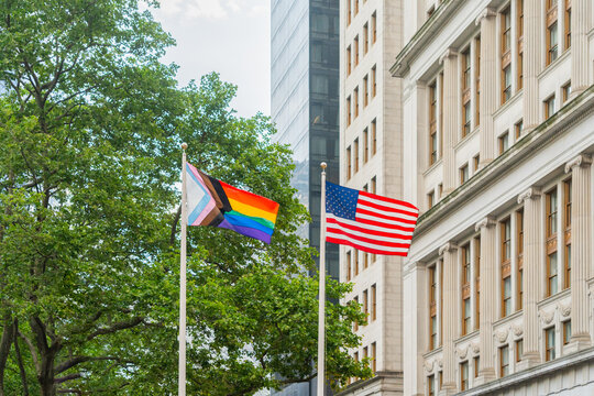 Progress Pride Flags Holding On The Street.