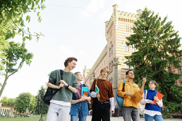 High school facility peer hang out carefree emotion connection stroll 