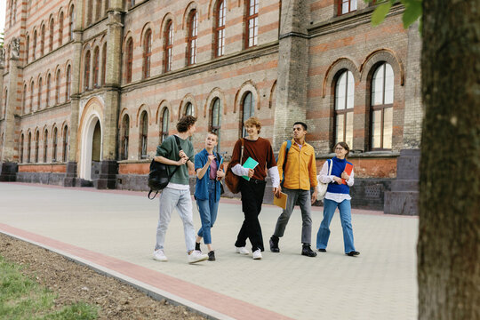 Undergraduate dormitory friends group calm discussion courtyard