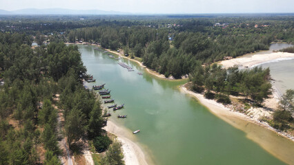 The view above has local fishing boats lined up at Panare Beach, a beautiful, clean, white sand beach. fresh air The surrounding area has long, shady pine trees, beautiful and suitable for relaxation.